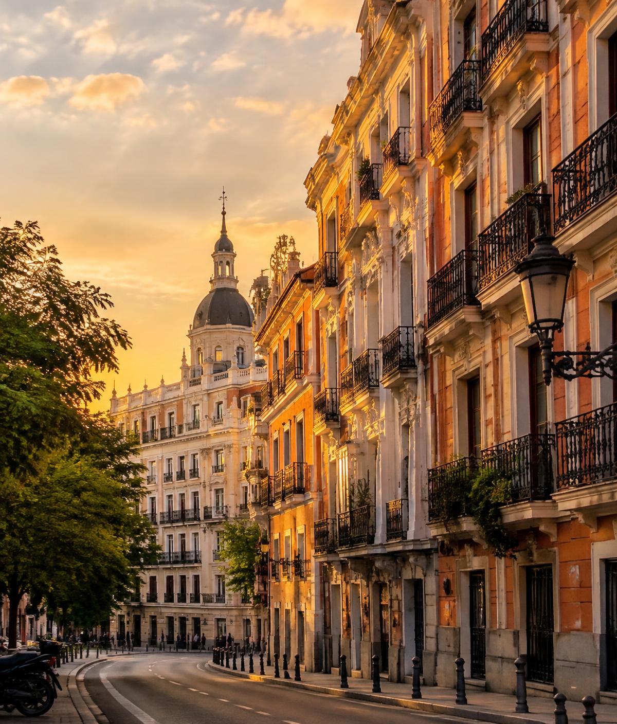 Historic façades on a Madrid street at sunset